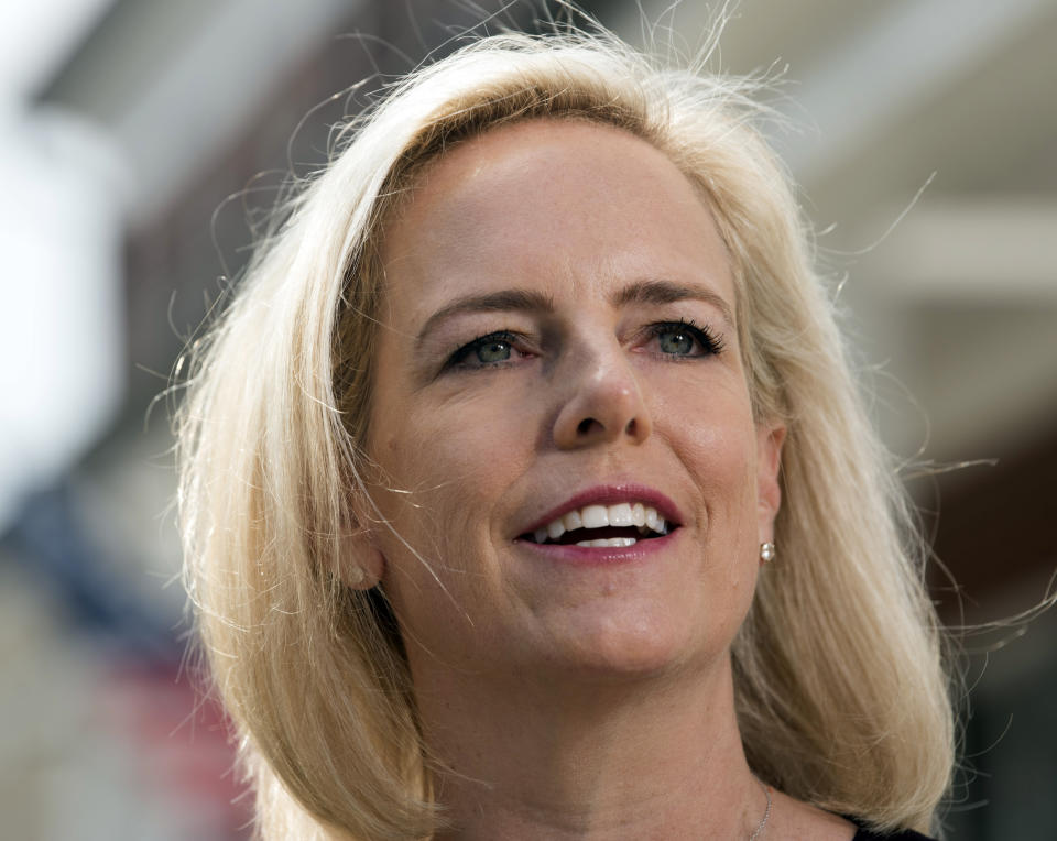 Homeland Security Secretary Kirstjen Nielsen talks outside her home in Alexandria, Va., on Monday, April 8, 2019. Nielsen says she continues to support the president’s goal of securing the border in her first public remarks since her surprise resignation. (AP Photo/Kevin Wolf)