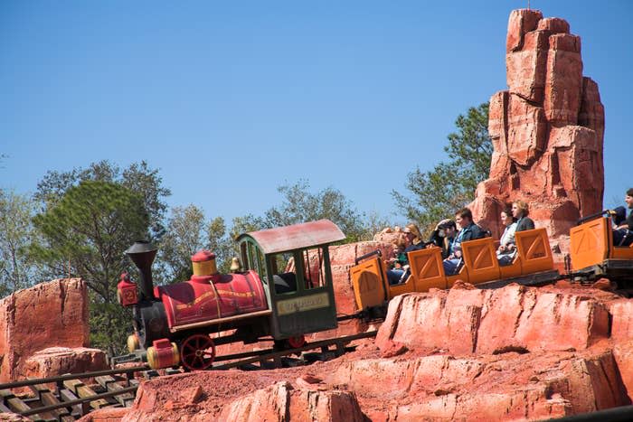 People riding Big Thunder Mountain Railroad