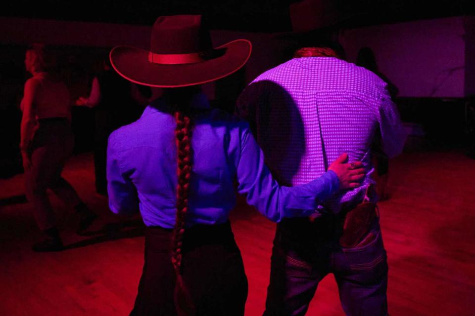 Brigid Reedy, left, dances with Tom Morton during the "Midnight Dance."