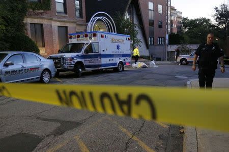 The ambulance used to transport a patient with possible Ebola symptoms is parked outside Beth Israel Deaconess Medical Center in Boston, Massachusetts October 12, 2014. REUTERS/Brian Snyder