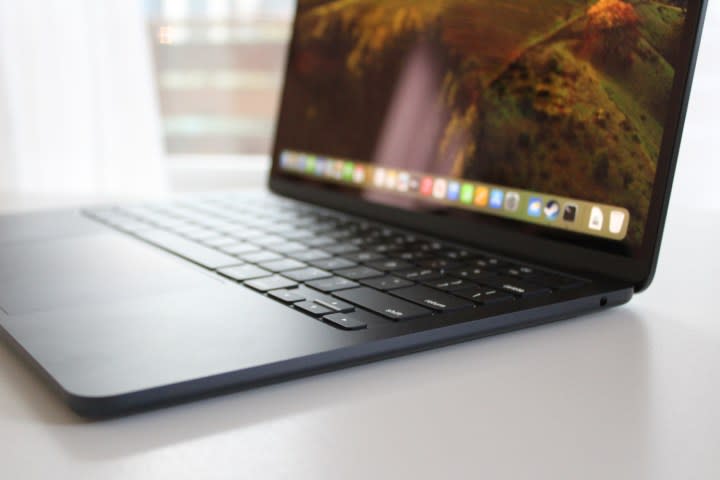 The MacBook Air on a white table.