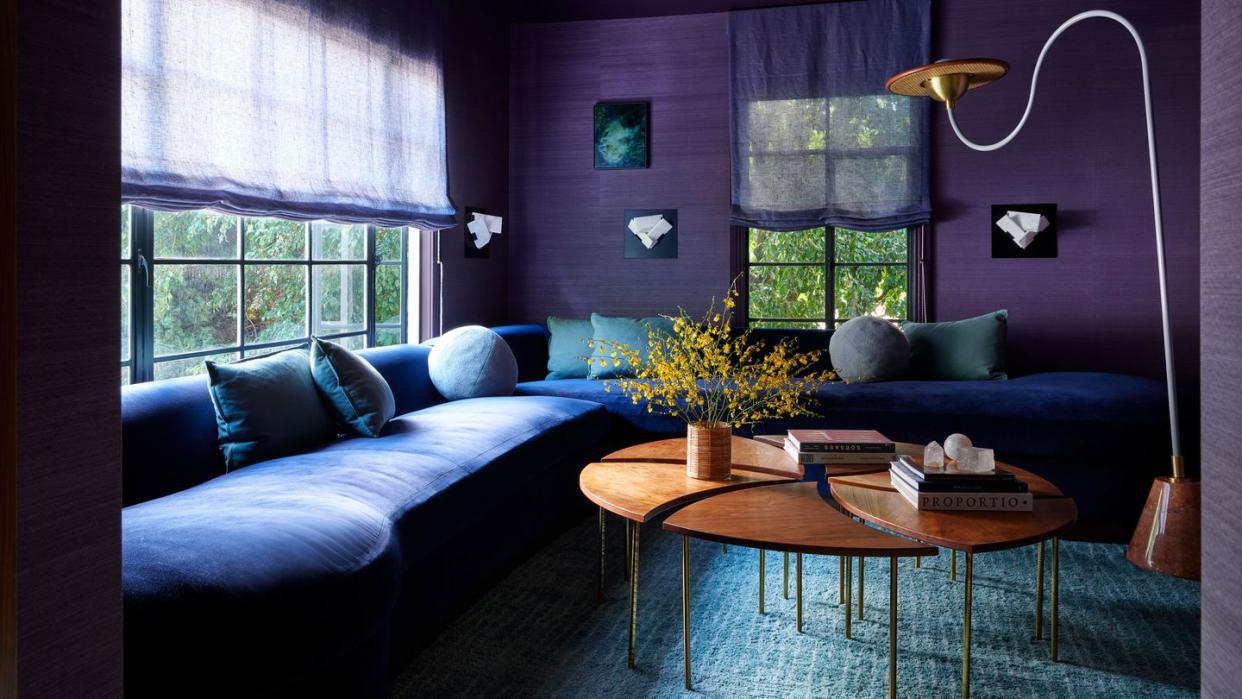 a living room with a couch and a coffee table