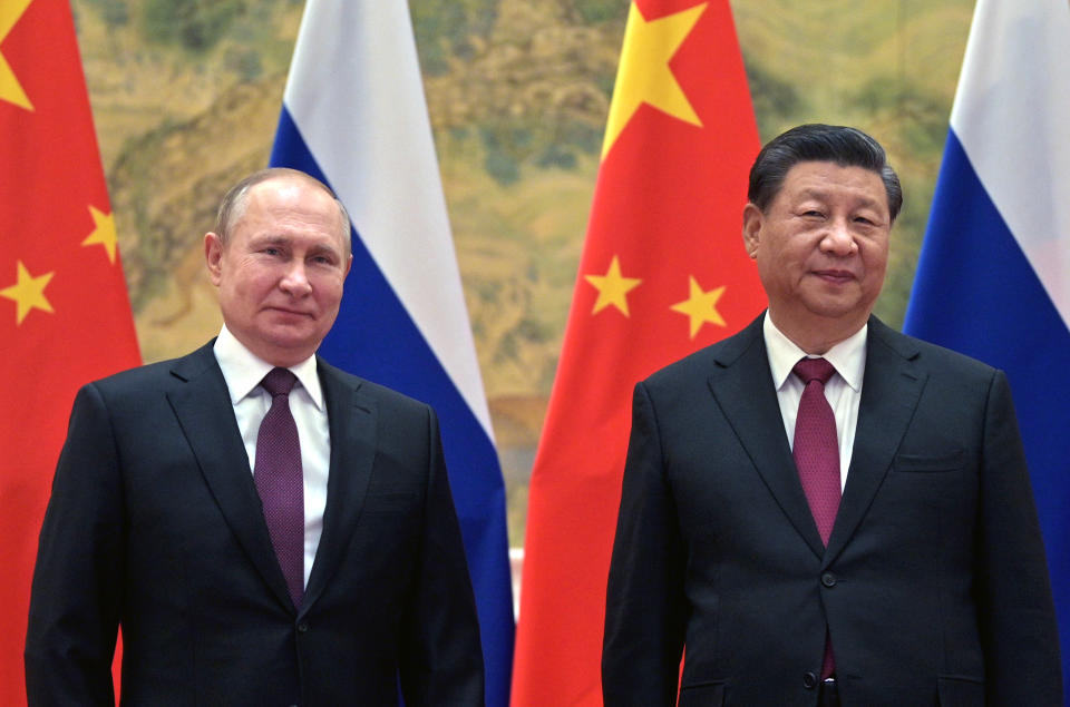 FILE - Chinese President Xi Jinping, right, and Russian President Vladimir Putin pose for a photo prior to their talks in Beijing, China, Feb. 4, 2022. One year into Russia's war against Ukraine, China is offering a 12-point proposal to end the fighting. (Alexei Druzhinin, Sputnik, Kremlin Pool Photo via AP, File)