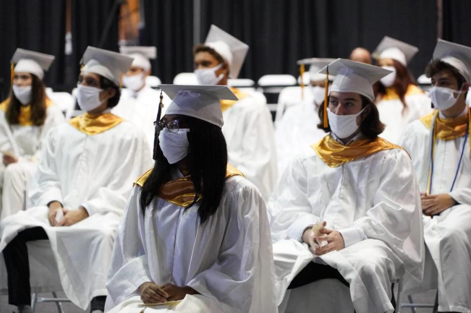 High school seniors from MAST@FIU Biscayne Bay Campus listen intently at their graduation ceremony Tuesday, June 1, 2021, at the Ocean Bank Convocation Center at Florida International University’s main campus.