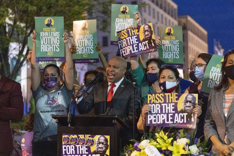 Texas State Rep. Carl Sherman and colleagues speaks during the Good Trouble Candlelight Vigil for Democracy supporting voting rights, at Black Lives Matter plaza in Washington, Saturday, July 17, 2021. (AP Photo/Jose Luis Magana)