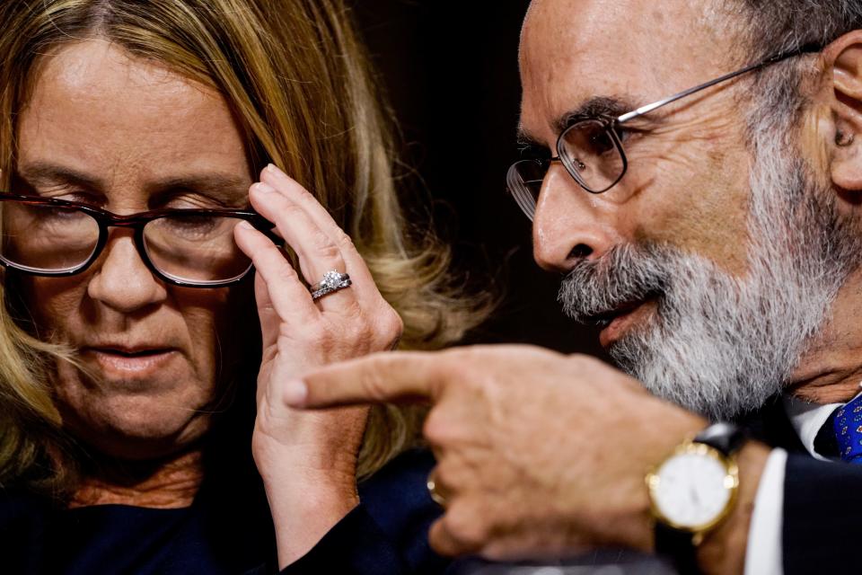 Christine Blasey Ford speaks with her lawyer Michael Bromwich.&nbsp;