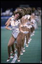 <div class="caption-credit"> Photo by: Getty Images/Mike Powell</div>High-cut leotards, silver lame, blue eye shadow… Yep, it's the eighties! Poofy-haired dancers interpreted a futuristic halftime show theme in 1986, at the Louisiana Superdome in New Orleans.