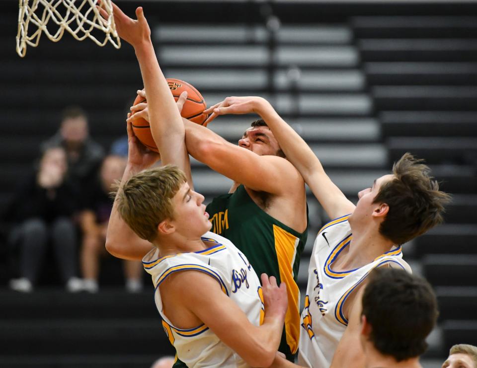 Carter Loesch of Sauk Rapids goes up for a shot during the first half of the game Tuesday, Dec. 7, 2021, at Sauk Rapids-Rice High School.