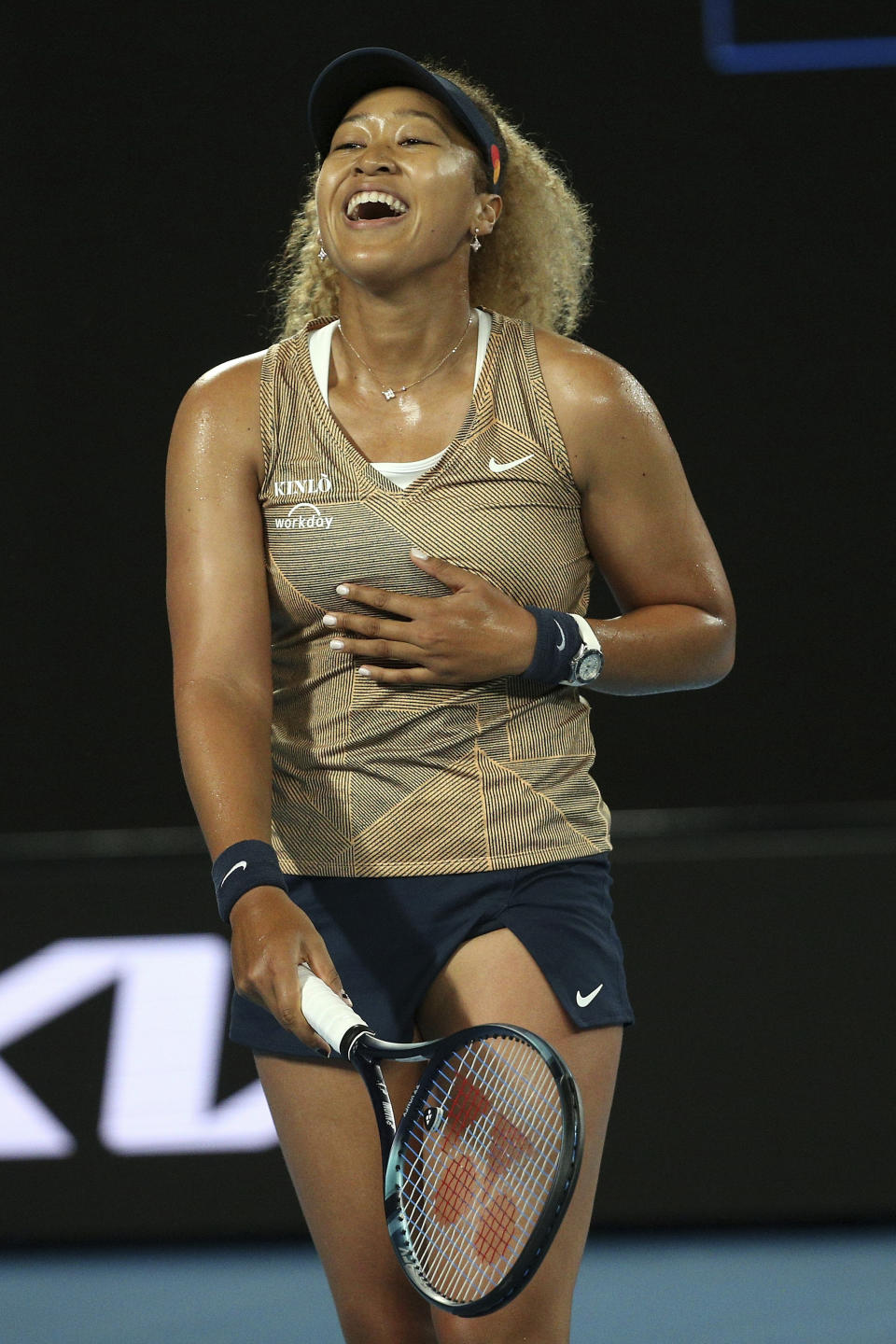 Naomi Osaka of Japan reacts during the singles match against Andrea Petkovic of Germany, at Summer Set tennis tournament ahead of the Australian Open in Melbourne, Australia, Friday, Jan. 7, 2022. (AP Photo/Hamish Blair)