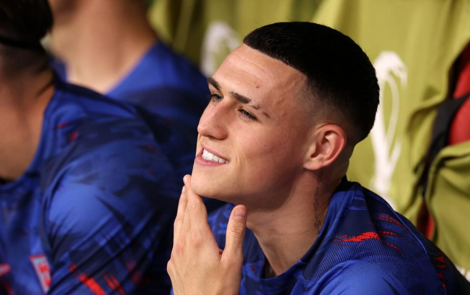 Phil Foden of England reacts in the dugout prior to the FIFA World Cup - GETTY IMAGES/Ryan Pierse