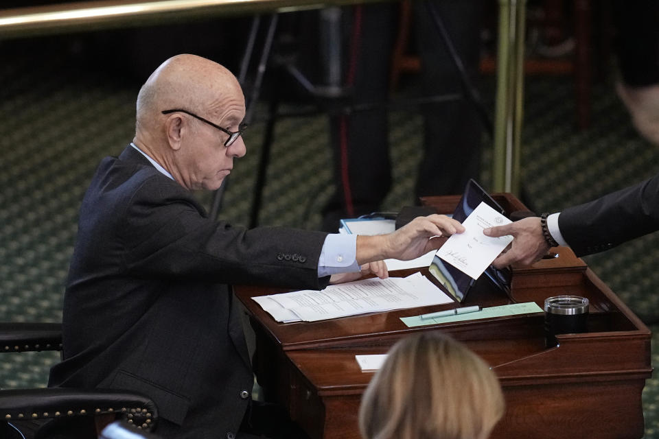 Texas state Sen. John Whitmire, D-Houston, votes on a article of impeachment in Texas Attorney General Ken Paxton's trial in the Senate Chamber at the Texas Capitol, Saturday, Sept. 16, 2023, in Austin, Texas. (AP Photo/Eric Gay)