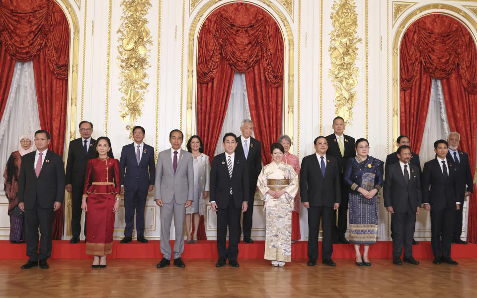 Front from left: Cambodian Prime Minister Hun Manet with his wife Pich Chanmony, Indonesian President Joko Widodo, Japanese Prime Minister Fumio Kishida with his wife Yuko, Lao Prime Minister Sonexay Siphandone with his wife Vandara and Brunei Sultan Haji Hassan Bolkiah with Prince Abdul Mateen; and back from left: Wan Aziz, wife of Malaysian Prime Minister Anwar bin Ibrahim with Anwar bin Ibrahim, Philippine President Fernand Marcos Jr. with his wife Loiuse Araneta, Singaporean Prime Minister Lee Hsien Loong with his wife Ho Ching, Thai Prime Minister Srettha Thavisin, Vietnamese Prime Minister Pham Minh Chinh and East Timor Prime Minister Xanana Gusmao pose for a photo prior to their dinner at the Akasaka Guesthouse in Tokyo, Saturday Dec. 16, 2023. ASEAN and Japan celebrate its 50th anniversary of their friendship and cooperation in Tokyo through December 18. (Yoshikazu Tsuno/Pool via AP)