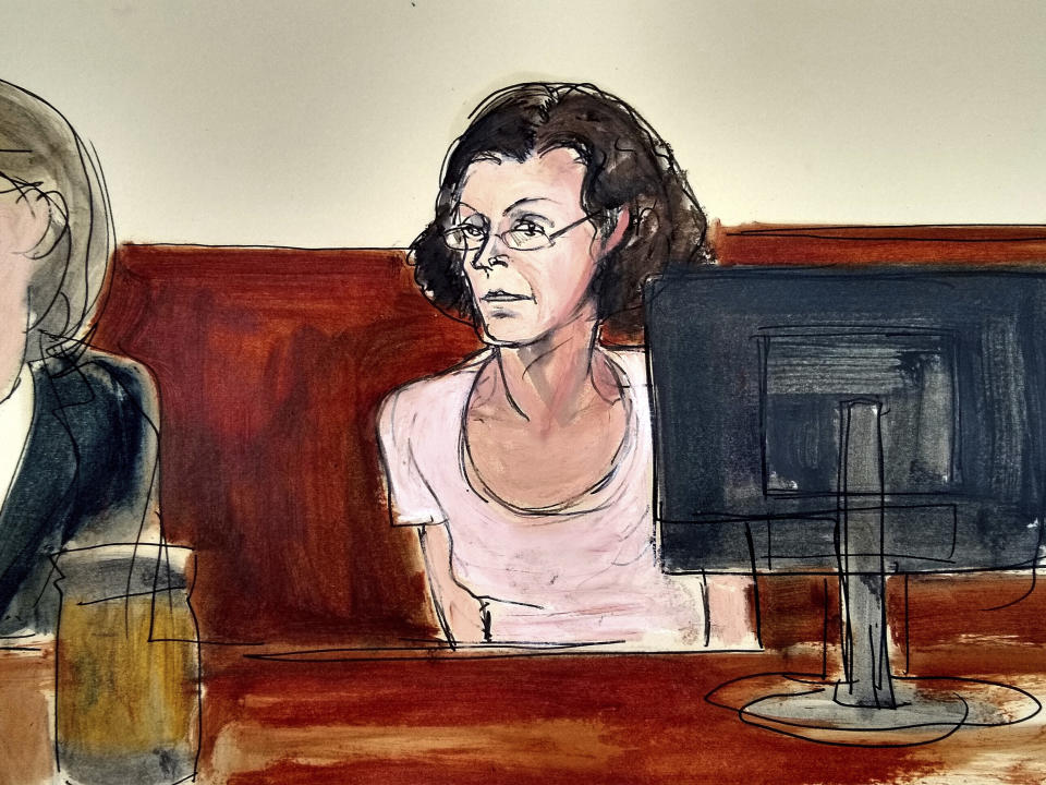 In this courtroom drawing, Clare Bronfman, is arraigned at federal court in New York, Tuesday, July 24, 2018. Bronfman, a daughter of the late billionaire philanthropist and former Seagram chairman Edgar Bronfman Sr., and three other people associated with the NXIVM organization were taken into custody and charged with racketeering conspiracy, the U.S. attorney's office in the Brooklyn borough of New York announced. (AP Photo/Elizabeth Williams)