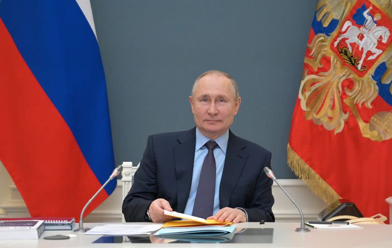 Russian President Putin attends a session of the Russian Geographical Society in Moscow