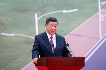 Chinese President Xi Jinping speaks during the opening ceremony of the China-Aid PNG Independence Boulevard Project ahead of the APEC summit in Port Moresby, Papua New Guinea, 16 November 2018. Mast Irham/Pool via REUTERS