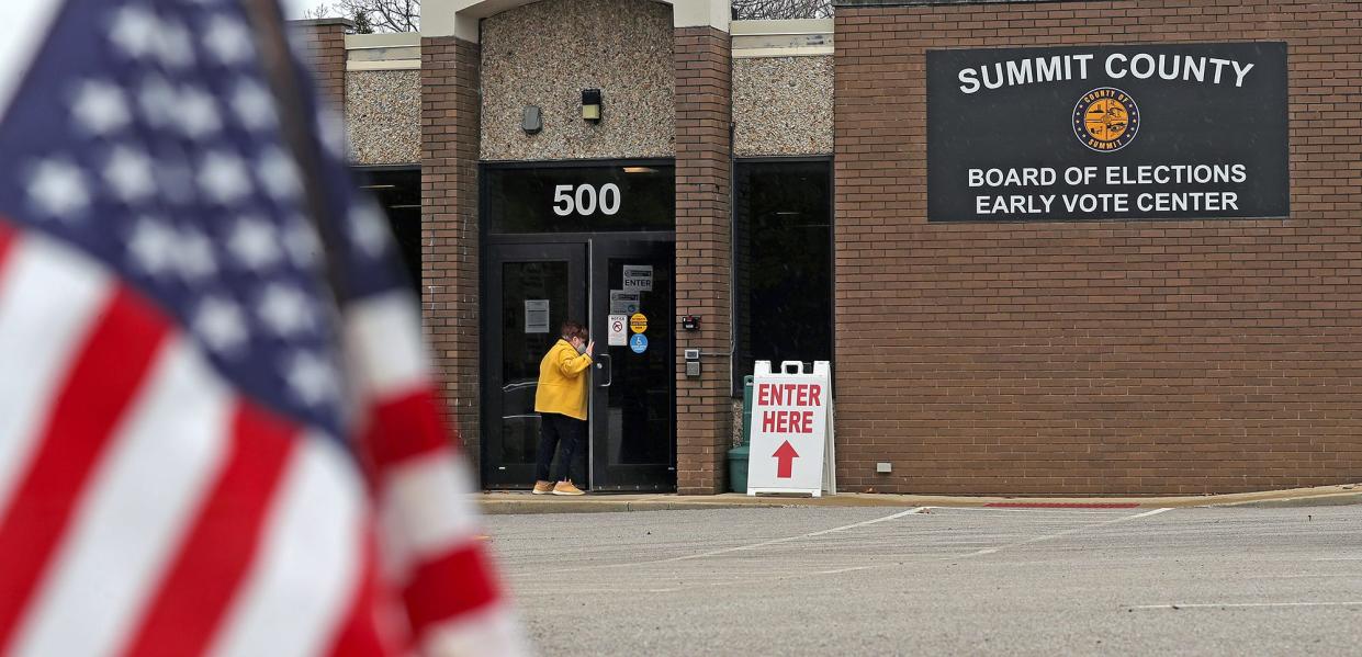A person enters the Summit County Board of Elections Early Vote Center on Wednesday, April 13, 2022, in Akron, Ohio.