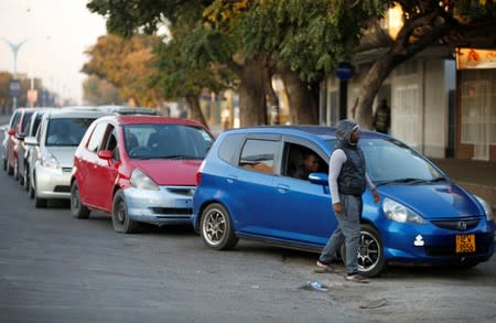 Motorists queue for fuel at a service station in Bulawayo