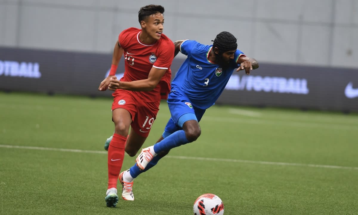 Singapore forward Ilhan Fandi (left) in action against the Maldives in an international friendly match at Jalan Besar Stadium. (PHOTO: Football Association of Singapore)