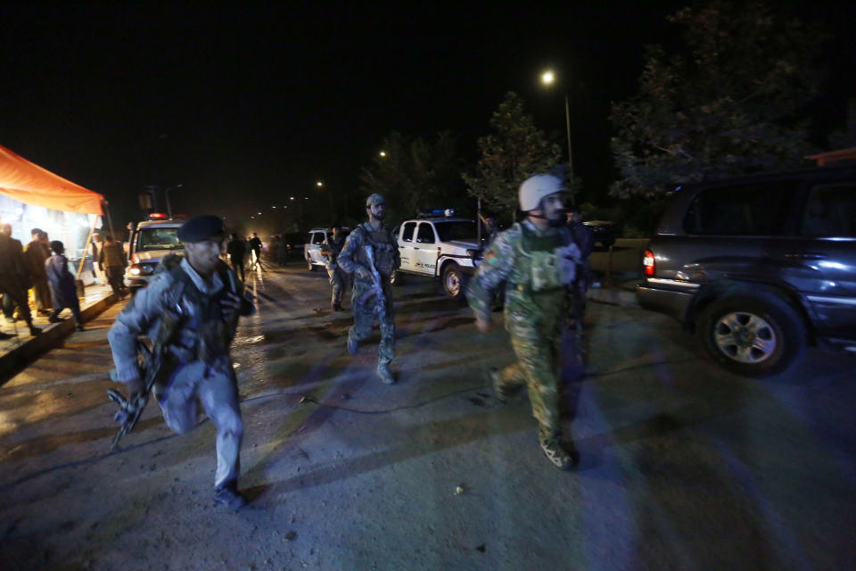 <p>Afghan security forces rush to respond to a complex Taliban attack on the campus of the American University in the Afghan capital Kabul on Wednesday, Aug. 24, 2016. (AP Photo/Rahmat Gul) </p>