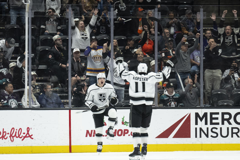 Los Angeles Kings left wing Kevin Fiala (22) celebrates his goal with center Anze Kopitar (11) during the first period of an NHL hockey game against the Anaheim Ducks, Friday, Nov. 24, 2023, in Anaheim, Calif. (AP Photo/Kyusung Gong)
