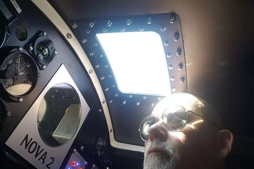 Steve Bennett inside the cockpit of his latest rocket