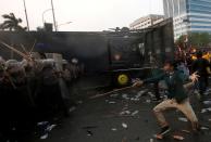 FILE PHOTO: University students protest outside the Indonesian parliament in Jakarta