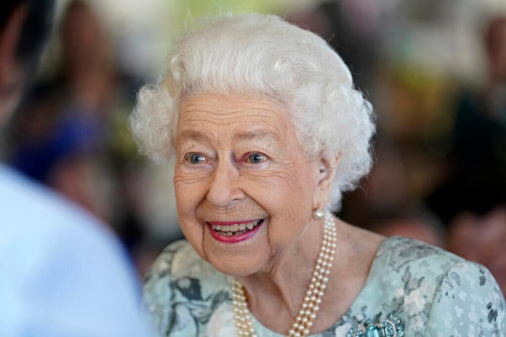 Britain’s Queen Elizabeth II looks on during a visit to officially open the new building at Thames Hospice, Maidenhead, England July 15, 2022. Buckingham Palace says Queen Elizabeth II is under medical supervision as doctors are “concerned for Her Majesty’s health.” The announcement comes a day after the 96-year-old monarch canceled a meeting of her Privy Council and was told to rest. (Kirsty O’Connor/Pool Photo via AP, File)