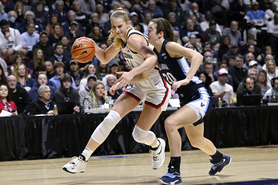 UConn's Dorka Juhasz is guarded by Villanova's Maddy Siegrist, right, during the first half of an NCAA college basketball game in the finals of the Big East Conference tournament, Monday, March 6, 2023, in Uncasville, Conn. (AP Photo/Jessica Hill)