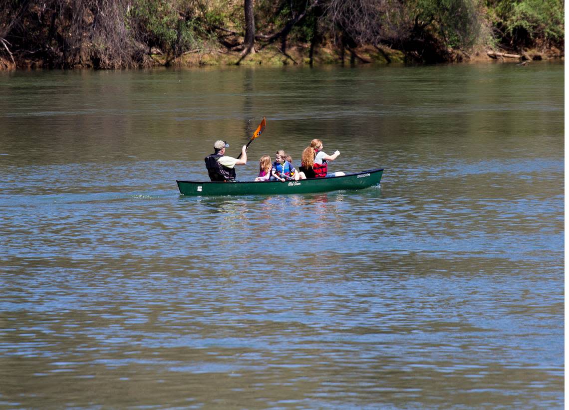 A family take a leisurely canoe tour of the Catawba River in Rock Hill.