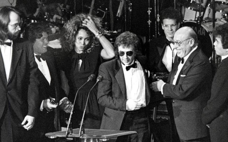 Tina Turner, Phil Spector, and Ahmet Ertegun at the 1989 ceremony - Getty 