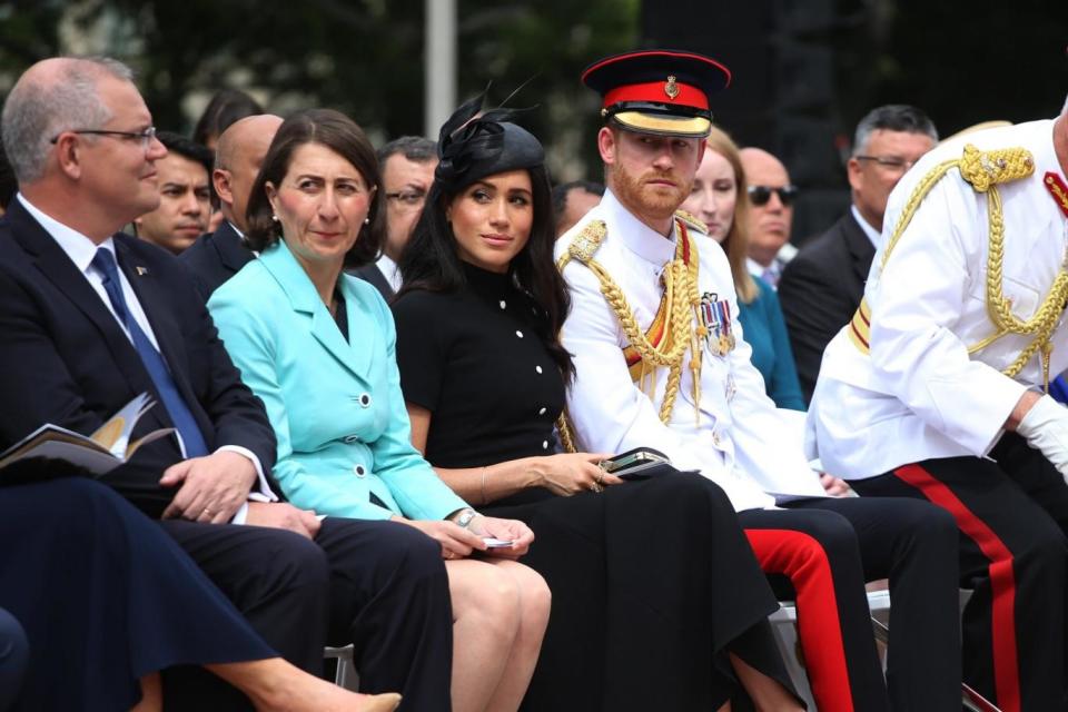 Meghan wore a black Emilia Wickstead dress and black Philip Treacy hat for the Anzac Memorial service earlier on Saturday (Getty Images)