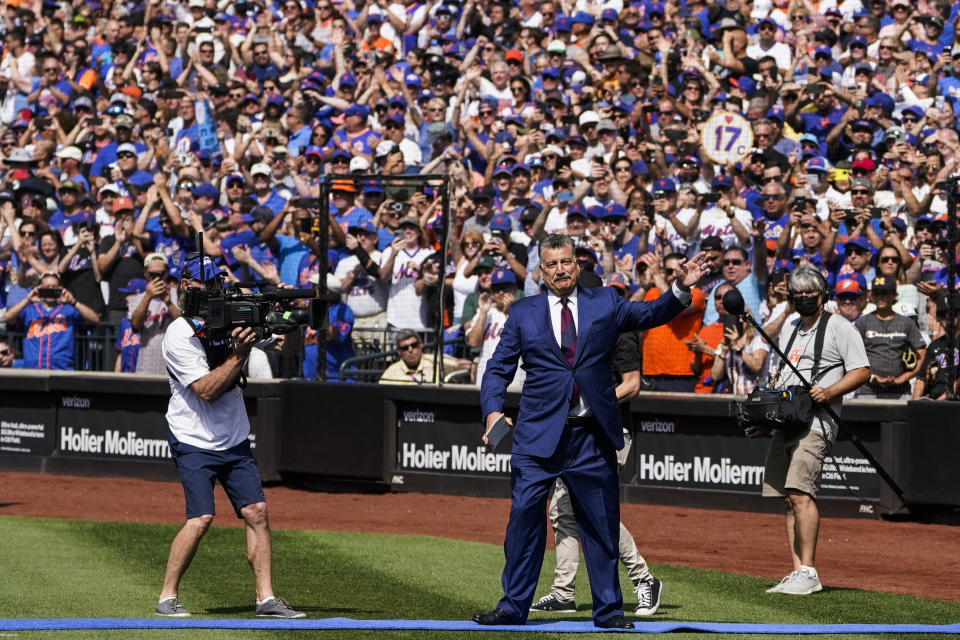 New York Mets announcer and former player Keith Hernandez is introduced to the crowds during a pre-game ceremony to retire his player number before a baseball game between the Mets and Miami Marlins, Saturday, July 9, 2022, in New York. (AP Photo/John Minchillo)
