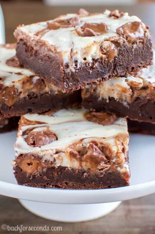 <p>Back for Seconds</p><p>These Milky Way Cheesecake Brownies combine the perfect fudgy brownie with smooth, creamy cheesecake and gooey Milky Way candy bars. An impressive dessert that’s easy to make! </p><p><strong>Get the recipe: <a href="https://backforseconds.com/milky-way-cheesecake-brownies/" rel="nofollow noopener" target="_blank" data-ylk="slk:Milky Way Cheesecake Brownies;elm:context_link;itc:0;sec:content-canvas" class="link rapid-noclick-resp">Milky Way Cheesecake Brownies</a></strong></p>