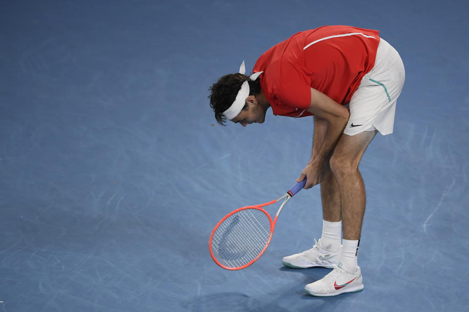 Taylor Fritz of the U.S. reacts during his fourth round match against Stefanos Tsitsipas of Greece at the Australian Open tennis championships in Melbourne, Australia, Monday, Jan. 24, 2022. (AP Photo/Andy Brownbill)