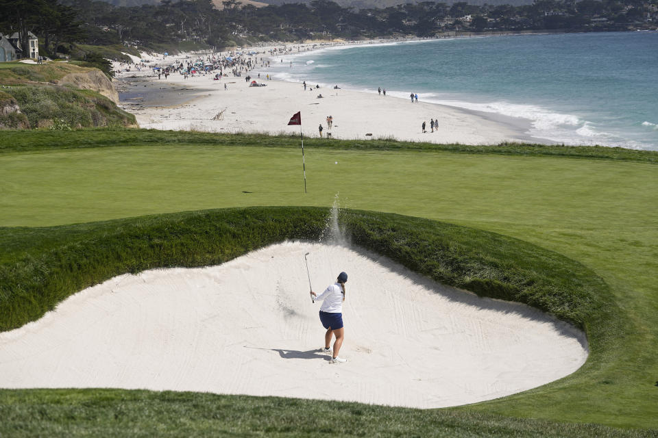 Bailey Tardy chips from a bunker to the ninth green during the third round of the U.S. Women's Open golf tournament at the Pebble Beach Golf Links, Saturday, July 8, 2023, in Pebble Beach, Calif. (AP Photo/Darron Cummings)