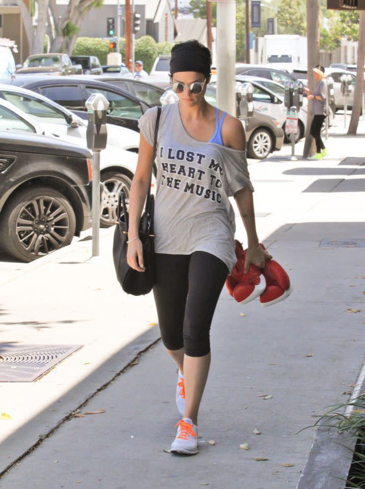 Kendall Jenner in a graphic t-shirt appropriate for her boxing workout.