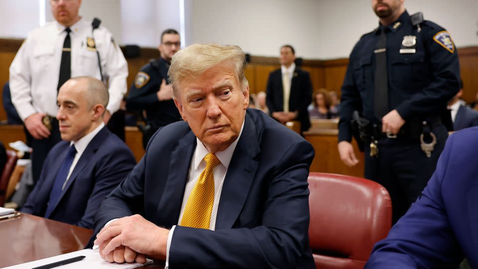Former President Donald Trump sits in a courtroom during his hush money trial at Manhattan Criminal Court on May 21, 2024, in New York City. He was convicted on all 34 counts. - Michael M. Santiago/Getty Images