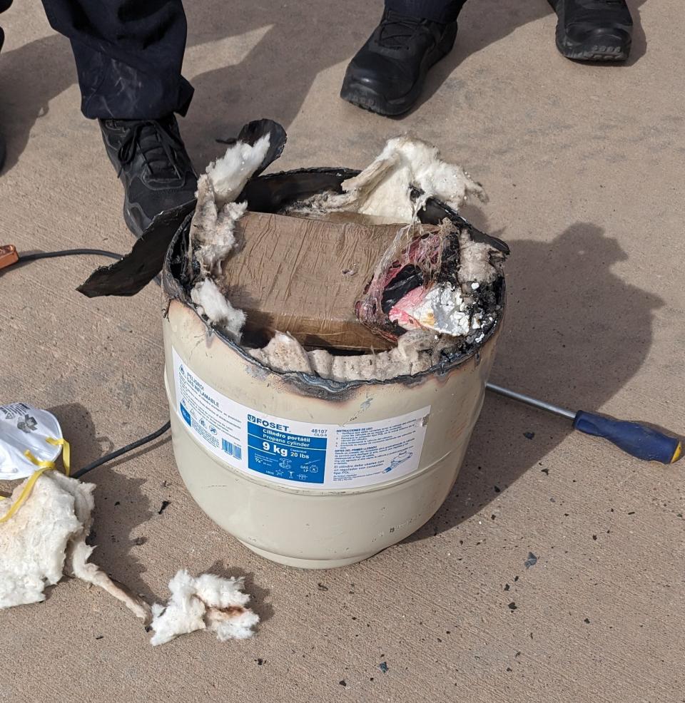 U.S. Customs and Border Protection officers seized nine drug-filled bundles containing 23.36 pounds of cocaine Saturday, Jan. 20, 2024, hidden in a propane tank in the trunk of a vehicle at the Marcelino Serna port of entry in Tornillo.