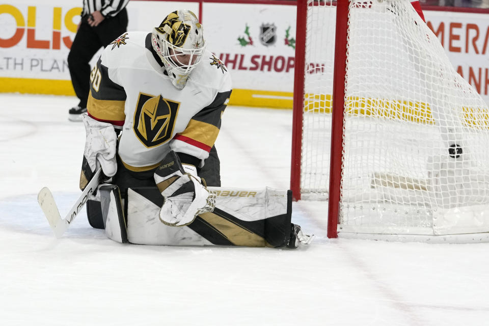 Vegas Golden Knights goaltender Jiri Patera (30) can't stop a goal scored by Florida Panthers center Sam Bennett during the second period of an NHL hockey game, Saturday, Dec. 23, 2023, in Sunrise, Fla. (AP Photo/Lynne Sladky)