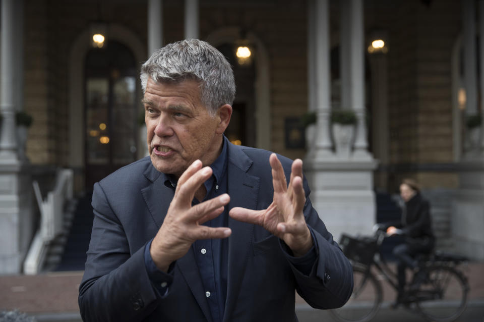 Self-styled Dutch positivity guru Emile Ratelband answers questions during an interview in Amsterdam, Netherlands, Monday, Dec. 3, 2018. A Dutch court has rejected the request of a self-styled positivity guru to shave 20 years off his age, in a case that drew worldwide attention. Emile Ratelband last month asked the court in Arnhem to formally change his date of birth to make him 49, instead of his real age of 69. He argued his request was consistent with other personal transformations, such as the ability to change one's name or gender. The Dutch court said age matters under Dutch law. (AP Photo/Peter Dejong)