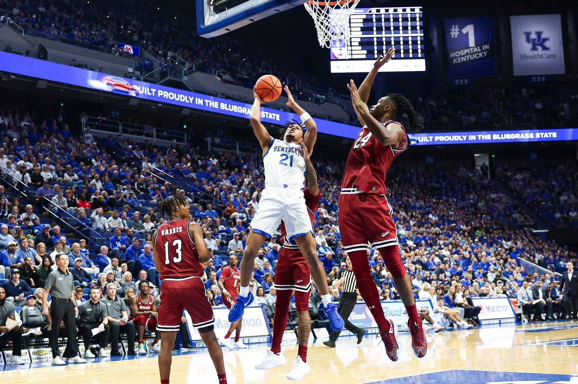 Kentucky Wildcats guard D.J. Wagner (21) drives to the basket against New Mexico State Aggies forward Jonathan Kanyanga (24) during the season opening game at Rupp Arena in Lexington, Ky, Monday, November 6, 2023. Silas Walker/swalker@herald-leader.com