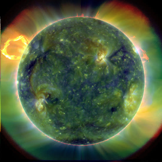 This image provided Wednesday, April 21, 2010 by NASA shows an eruptive prominence blasting away from the sun, upper left, March 30, 2010 observed by the Solar Dynamics Observatory satellite. NASA on Wednesday unveiled the first images from the new satellite designed to predict disruptive solar storms, and scientists say they're already learning new things. (AP Photo/NASA)