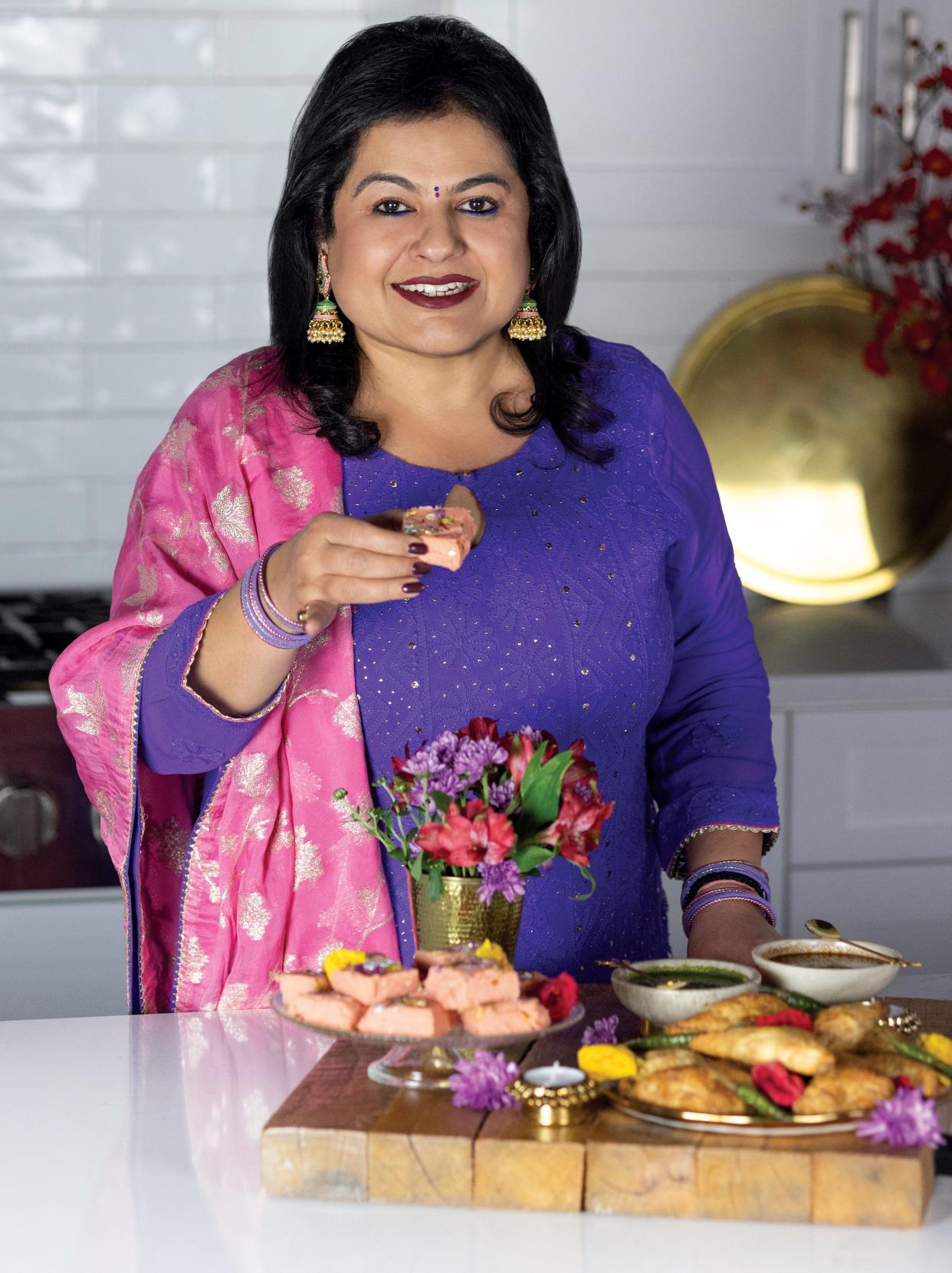 Influencer Anjali Dhir captures the essence of Diwali in traditional attire with homemade Rose Kalakand, potato puffs, and the glow of the Diwali lamp.