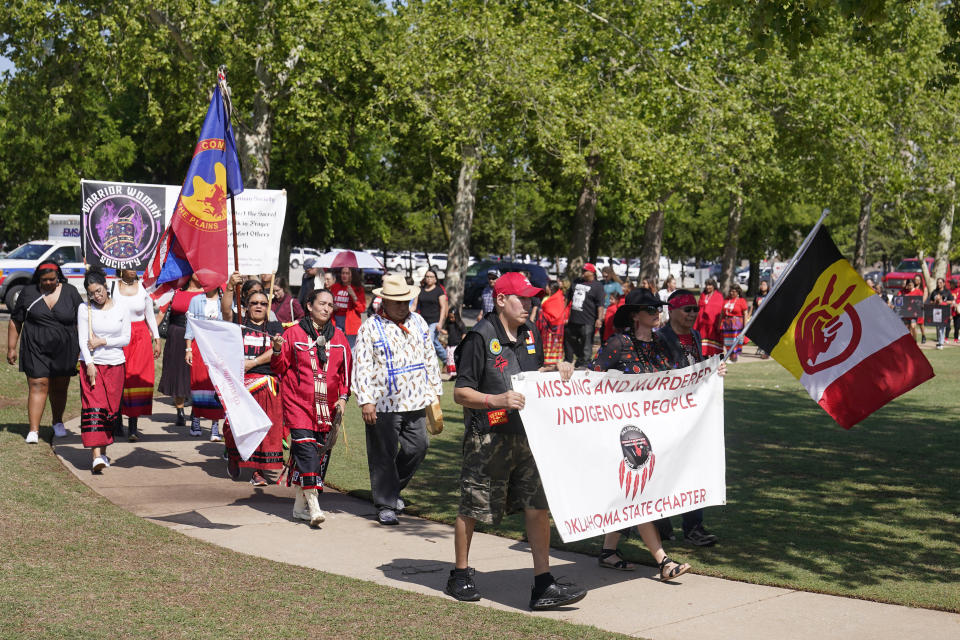 People participate in a memorial walk at the state Capitol on Missing and Murdered Indigenous Peoples Awareness Day, Friday, May 5, 2023, in Oklahoma City. (AP Photo/Sue Ogrocki)