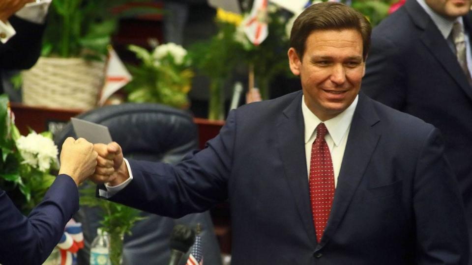 Gov. Ron DeSantis signs the so-called Stop WOKE Act, which restricts how race is discussed in schools.
