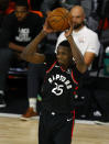 Toronto Raptors' Chris Boucher looks to pass against the Milwaukee Bucks during the second quarter of an NBA basketball game Monday, Aug. 10, 2020, in Lake Buena Vista, Fla. (Mike Ehrmann/Pool Photo via AP)