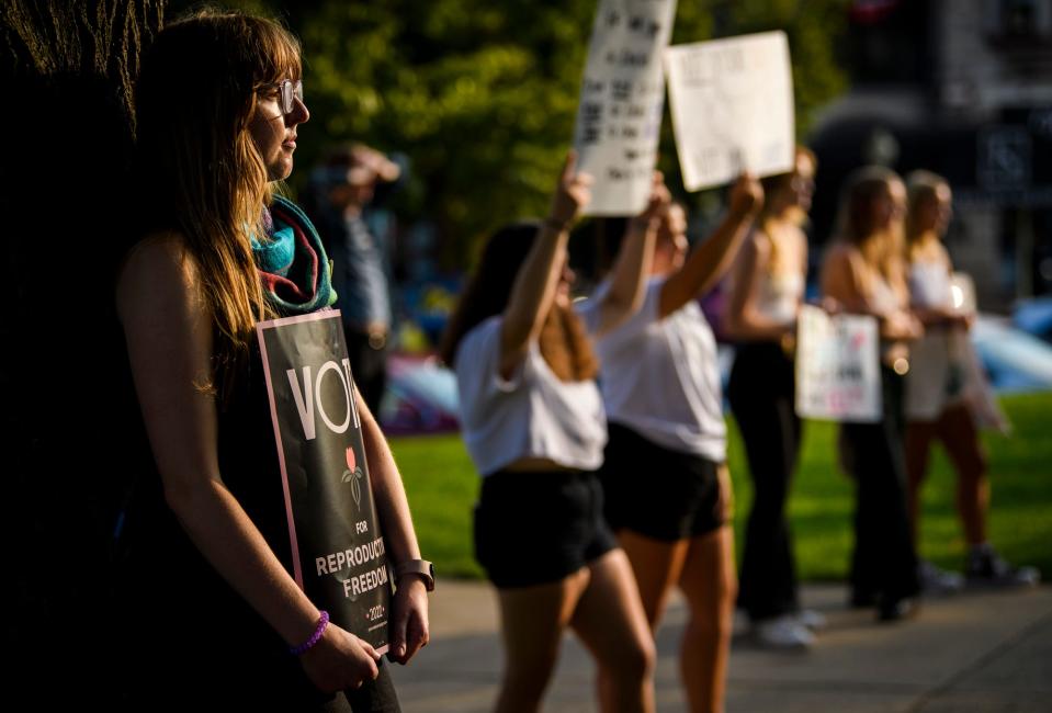 Louise Farrell listens to speakers at the Monroe County Courthouse on Wednesday, Sept. 14, 2022 during the We Are Hoosiers: A Vigil for Reproductive Freedom demonstration before the near total abortion ban goes into effect on Sept. 15, 2022.