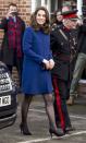 <p>In a royal blue <a href="http://www.goatfashion.com/us/ellory-coat-marine?siteID=TnL5HPStwNw-NkF4IqbdDendphDIh8ed5Q" rel="nofollow noopener" target="_blank" data-ylk="slk:Goat Ellory Bow Detail;elm:context_link;itc:0;sec:content-canvas" class="link ">Goat Ellory Bow Detail</a> coat paired with black heels, carrying a <a href="https://www.aspinaloflondon.com/leather-handbags/clutch-bags" rel="nofollow noopener" target="_blank" data-ylk="slk:Aspinal of London;elm:context_link;itc:0;sec:content-canvas" class="link ">Aspinal of London</a> clutch for the opening of a community-based drug addition treatment center in Essex, England.</p>