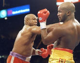 3. George Foreman KO10 Michael Moorer, Nov. 5, 1994 – Foreman was 45 years old and trying to regain the heavyweight title. He was being badly outboxed by Moorer throughout the first nine rounds, when his legendary punching power came to the rescue. Foreman threw a jab and a straight right behind it, crumpling Moorer, as HBO broadcaster Jim Lampley shouted, "It happened! It happened!" Foreman became, at 45, the sport's oldest heavyweight champion. (Photo credit: Getty)