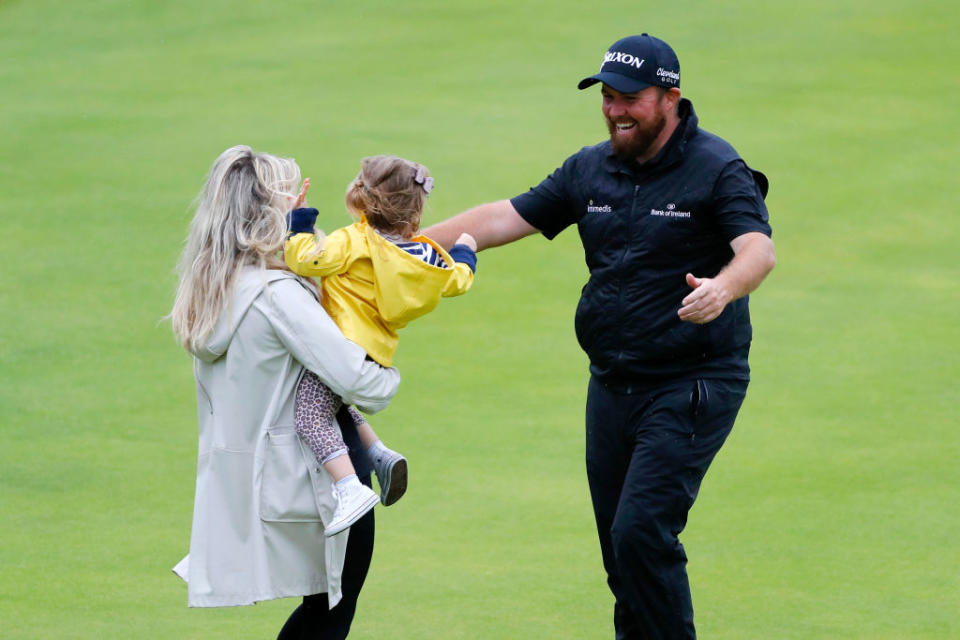 PORTRUSH, NORTHERN IRELAND - JULY 21: Open Champion Shane Lowry of Ireland celebrates with wife Wendy and daughter Iris on the 18th green during the final round of the 148th Open Championship held on the Dunluce Links at Royal Portrush Golf Club on July 21, 2019 in Portrush, United Kingdom. (Photo by Kevin C. Cox/Getty Images)